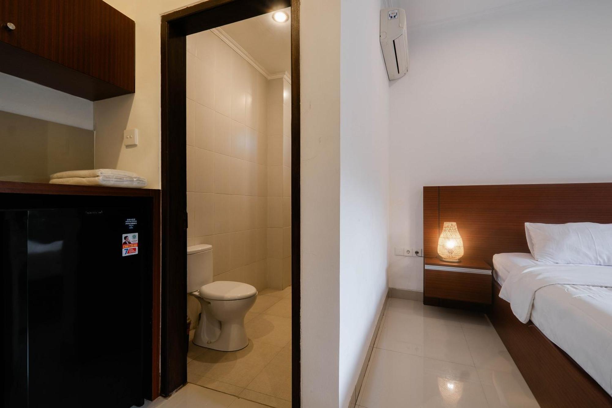 Puri Kasih Home Stay Санур Экстерьер фото