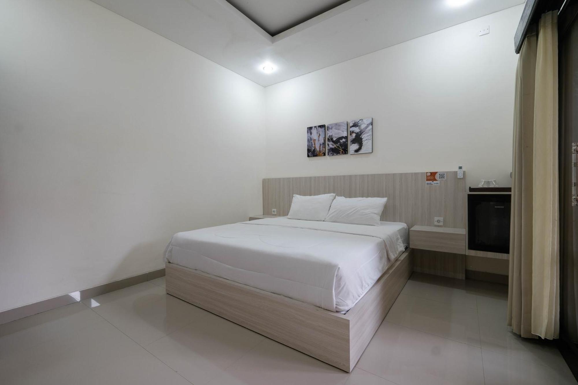 Puri Kasih Home Stay Санур Экстерьер фото